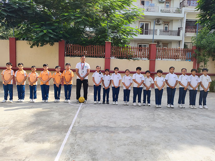 Students playing sports at Suncity School 45